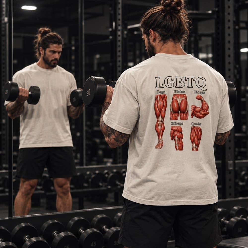 Lifter sitting on a bench in the LGBTQ tee